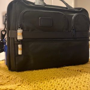 Tumi Alpha expandable laptop messenger bag